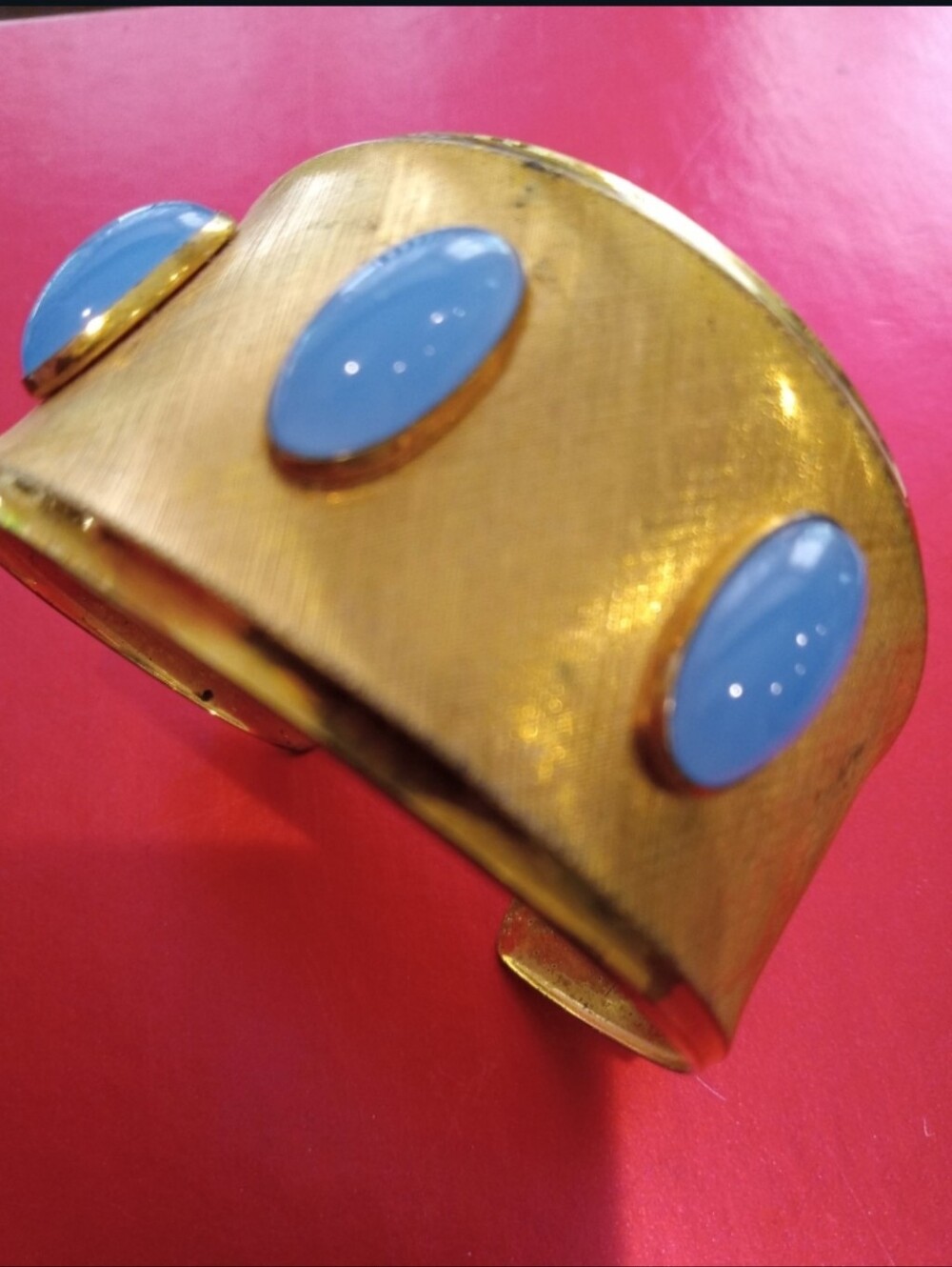 Gold Cuff Bracelet with Blue Cabochon Accents